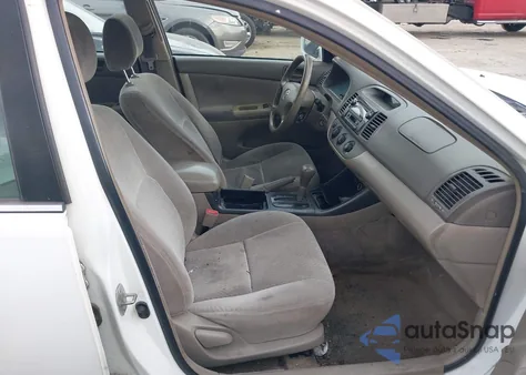 2003 Toyota Camry Le from USA, damaged, VIN 4T1BE32K33U219697